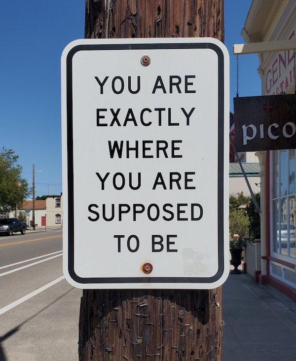 Sign along Bell Street in Los Alamos, CA reading, "YOU ARE EXACTLY WHERE YOU ARE SUPPOSED TO BE."